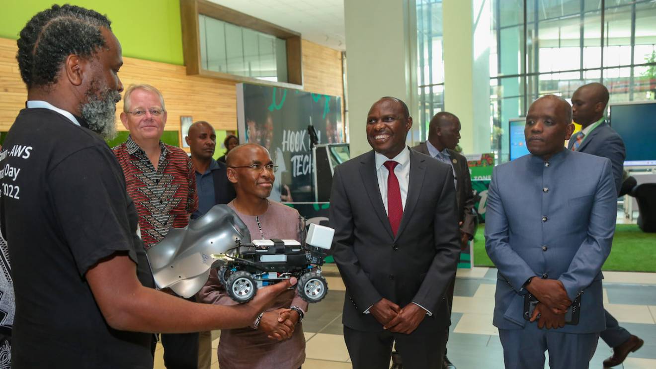 From left, Sello Tseka, Peter Ndegwa, CEO Safaricom PLC, Felix Koskei,  Dennis Itumbi during engineering summit held at Sarit Expo centre. PHOTO/COURTESY